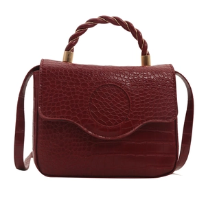 Elegant red crocodile pattern square handbag with gold hardware and top handle strap