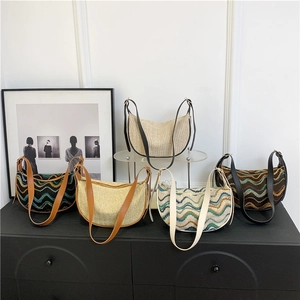 Group of striped dumpling bags and straw crossbody bags with leather straps in retro style