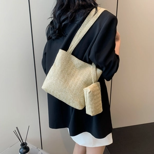 Women's straw woven tote bag set with shoulder strap and matching inner pouch for summer beach
