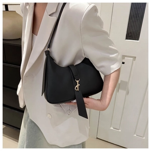 Fashionable black matte leather crescent underarm bag with gold metal buckle detail
