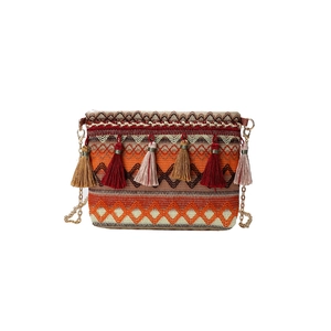 Ethnic bohemian woven crossbody bag with colorful tassels and a golden chain strap