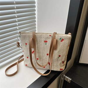 Handwoven straw tote bag with cherry embroidery and detachable brown leather strap