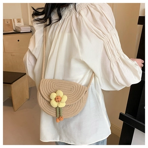 Detailed woven saddle bag texture featuring a cute 3D sunflower and woven rope strap