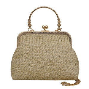 Beige straw shell bag with gold metal frame, vintage woven texture, and chain strap