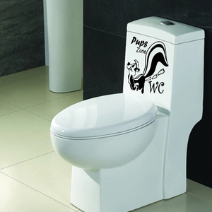 Close-up of PVC toilet sticker with skunk and Pups Zone WC text on ceramic tank