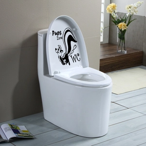 Macro detail of waterproof cartoon skunk toilet sticker featuring Pups Zone and WC text