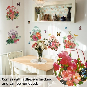 Floral birdcage and butterfly wall decals in a warm dining room scene with macro detail