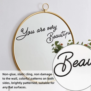 Detail of 'You are very Beautiful' black script static cling decal on a round mirror