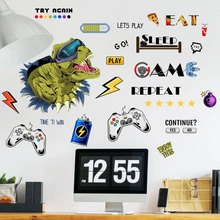 Detail of gaming-style PVC wall stickers featuring VR dinosaur and retro controllers