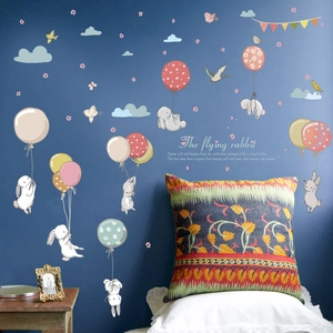 Flying rabbits wall stickers with balloons and clouds for nursery decor