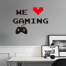 Detail of creative pixel style 'WE GAMING' wall sticker with heart and game controller icon