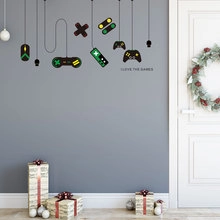 Gamer wall sticker set with gaming controller and 'I LOVE THE GAMES' slogan for decor