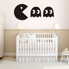 Classic Pac-Man and ghost wall stickers in matte black vinyl for home decor