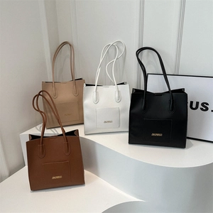 Grands sacs cabas en PU de plusieurs couleurs avec poche avant et doubles anses