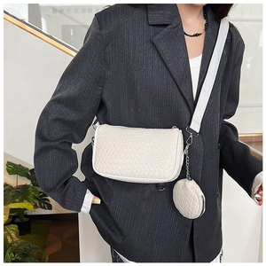 White woven shoulder bag with small round coin purse and silver metal chain detail