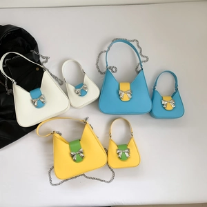 Chic minimalist underarm handbag with silver bow buckle and chain strap in multiple colors