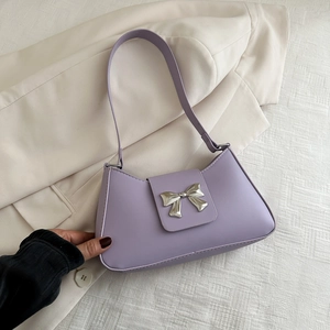 Lavender faux leather baguette shoulder bag with a silver metal bow accent