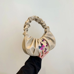 Chic beige ruched cloud underarm bag with butterfly print and crescent moon shape