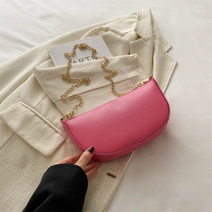 Pink crescent dumpling bag with lychee texture PU leather and gold chain strap
