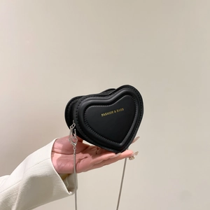 Mini heart-shaped black PU leather crossbody bag with gold lettering and silver chain strap