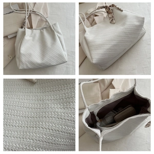 Macro detail of white woven tote bag with herringbone pattern and silk scarf accent