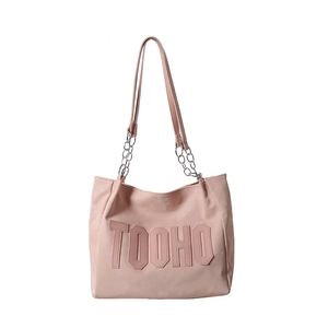 Pink tote bag with embossed letter TOOHO and chain shoulder strap on white background