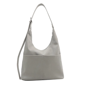 Sac fourre-tout gris minimaliste avec poches frontales et bandoulière réglable