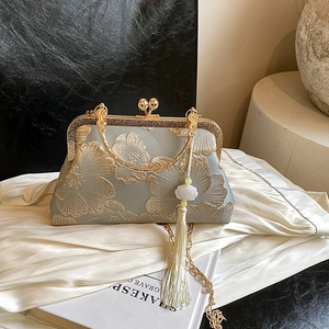 Elegant Chinese style green floral embroidery kiss-lock handbag with silk tassel