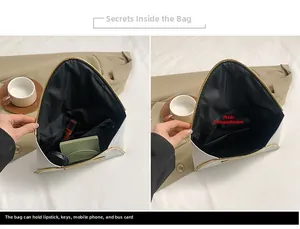 Vue intérieure montrant la capacité de rangement de la pochette enveloppe blanche chic