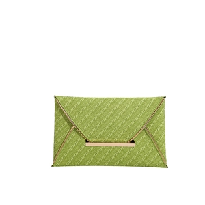 Summer green envelope clutch bag with straw texture and golden metallic magnetic clasp