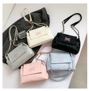 Detailed embroidery butterfly patterns and chain straps on five colored shoulder bags