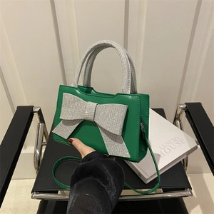 Damen PU Leder Handtasche Mit Großer Silberner Glitzer Schleife Schicke Trendige Schultertasche Umhängetasche