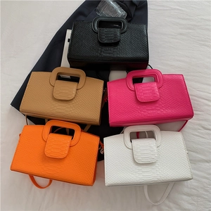 Chic faux crocodile texture tote bags shown in five colors with integrated handles