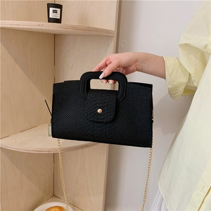 Elegant black crocodile pattern handbag with gold chain strap and square handle