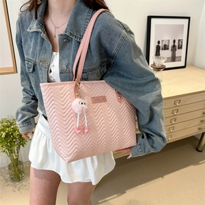 Pink quilted tote bag with cute plush pendant for women, stylish large shoulder bag for work