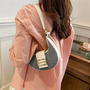 Retro patchwork half-moon shoulder bag in grey denim and cream leather with gold buckle