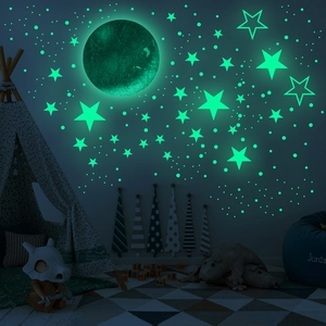 Luminous Mars wall stickers set with moon and stars glowing in a dark kids bedroom