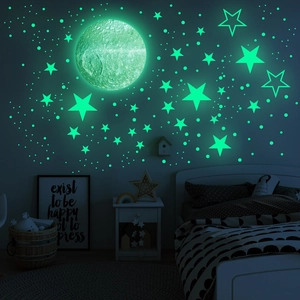 Luminous wall stickers featuring moon and stars glowing in the dark for nursery decor
