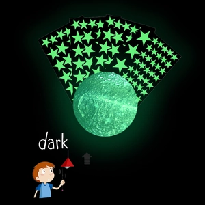 Luminous wall stickers set featuring glowing stars and a full moon for kids' bedroom