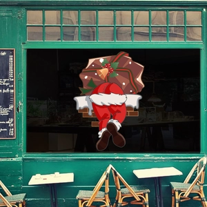 Christmas Santa Claus climbing wall sticker with gift bag for festive window decoration