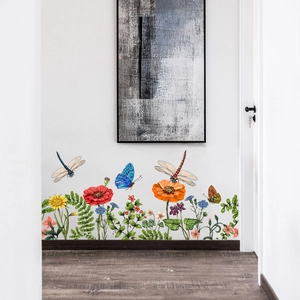 Floral wall stickers featuring red poppies, green ferns, and blue butterflies for home decor