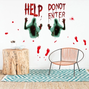 Scary Halloween wall sticker with bloody handprints and shadows on white wall