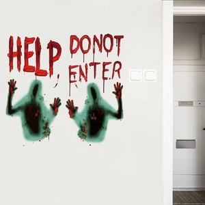 Close-up of blood-red HELP and DO NOT ENTER zombie wall decals on a white room wall