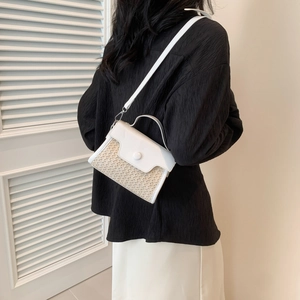 Minimalist summer patchwork crossbody bag featuring white leather and woven straw texture