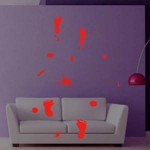DIY Halloween bloody footprint and splatter decals on a living room wall decoration