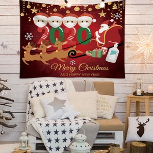 Vue détaillée d'une tapisserie de Noël rouge avec Père Noël et renne sur mur en bois