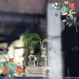 Detail of clear glass vases with twine in a wooden home box for hydroponic plants