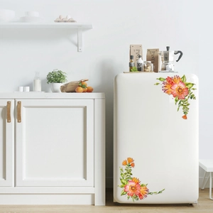 Close-up of floral watercolor wall stickers applied to a white retro refrigerator