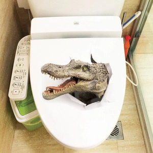 Detailed 3D dinosaur sticker application on a modern white toilet lid in a bathroom