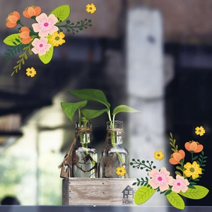 Minimalist hydroponic glass vases with hemp rope in a wooden 'HOME' tray with green plants